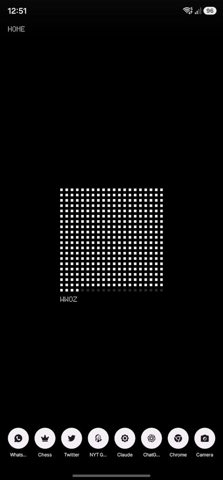 Control's idle Phone wallpaper: a grid of white dots with "WWOZ" beneath it.